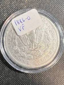 lot 56B image: 1886-O US MORGAN SILVER DOLLAR IN AIRTITE