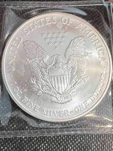 lot 12 image: 2006 AMERICAN SILVER EAGLE 1 TROY OZ .999 FINE SILVER