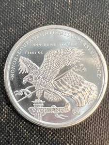 lot 13 image: 1 TROY OZ .999 FINE SILVER DONALD TRUMP ROUND