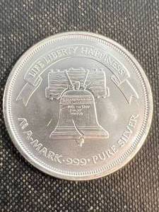 lot 28 image: 1 TROY OZ .999 FINE SILVER LIBERTY A-MARK ROUND