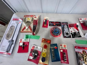 lot 6 image: TABLE FULL OF AUTO SPECIALTY TOOLS