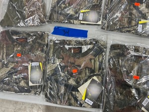 lot 34 image: TABLE FULL OF MENS CAMO SHIRTS & THERMAL LONG JOHNS