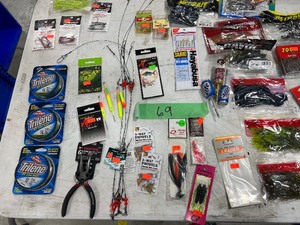 lot 69 image: TABLE FULL OF FISHERMANS LOT