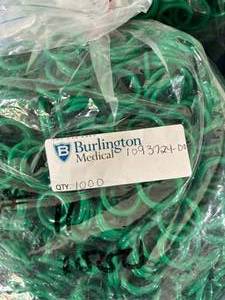 lot 104 image: MSRP $400  4 Bags (1000ct each bag) NEW Burlington Medical Plastic IV Bag Rings - Green