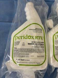 lot 164 image: MSRP $300  4 Bottles NEW Peridox 0.9L RTU Mold Killing Antimicrobial Solution - Expiration 0725
