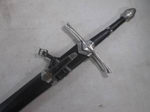 lot 1 image: (A-3) Lord of the Rings Sword with Knife and Scabbard also Includes Hanging Plaque - Sword is 43 34 Long Knife is 10 12 Long - Scabbard Has Issues See Photos