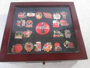 lot 84 image: (CNTR) The Ultimate Coca-Cola Pin Collection in Wood Glass Top Display Case