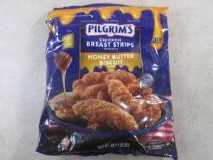 lot 258 image: (FRZ) 3 Pound Bag Frozen Chicken Breast Strips Fritter Style Honey Butter Biscuit Flavor Past Date
