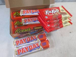 lot 286 image: (B-1) Box of 12 King Size Candy Bars 4 Each of Kit Kat, Pay Day and Reeses Peanut Butter Cups Best by Date Vary March - Aug 2024