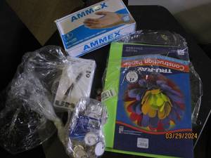 lot of pens, key holders , exam gloves and paper