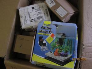box of fish tank items and reptile lights