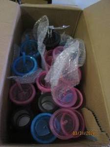 box of cups with straws and mor e...