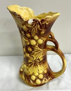 lot 70 image: Vintage McCoy Pottery Grapes and Leaves Pitcher
