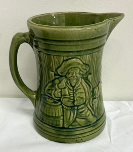 lot 78 image: Vintage McCoy Pottery Buccaneer Pitcher and Mug with Buttermilk Pitcher