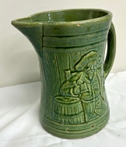 lot 172 image: Vintage McCoy Pottery Buccaneer Pitcher