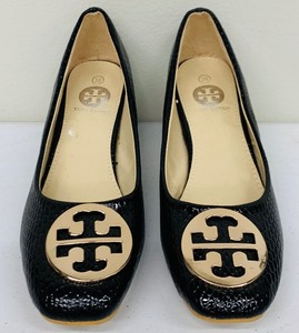 lot 83 image: Tory Burch Black Cap Toe Pumps