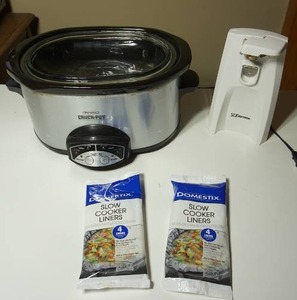 lot 211 image: Small Kitchen Appliances...Rival Crockpot, Slow Cooker Liners, Emerson Electric Can Opener Sharpener()