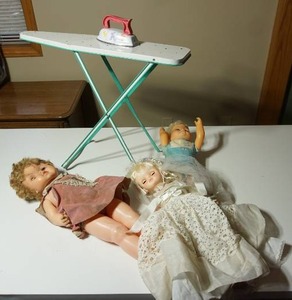 lot 233 image: Vintage Toys...Tin Ironing Board and Iron, Plastic Bridal Doll wGarter Etc