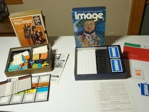 lot 237 image: Vintage Board Games...1969 The WORLD of WALL STREET Hasbro 4000 Board Game Bookshelf, 1972 Image 3M Bookshelf Board Game Complete The Who What Where and When Game