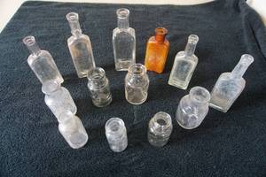 lot 23 image: Collectible Vintage Glass Bottles