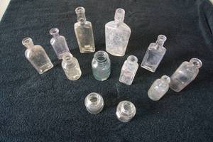 lot 24 image: Collectible Vintage Glass Bottles