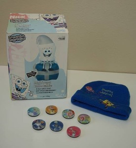 lot 41 image: Vintage SpongeBob Squarepants 4 Foot Inflatable, 7 Tazo Taps Crystals, Knit Hat...