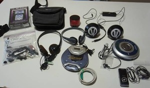 lot 116 image: A Whole Lot of Electronics Including Philips Discman CD Anti-Skip Portable CD Player, New Sound 3-In-1 MP3 Sports Kit...
