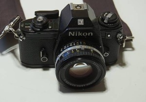 lot 121 image: Vintage 35 mm Film Camera Nikon EM with 50 mm f1.8 NIKKOR Lens