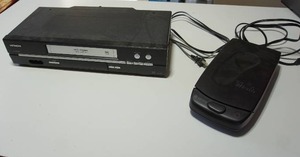 lot 134 image: Hitachi VT-FX695A VHS Video Cassette Recorder VCR, Vintage KINYO VHS Tape Video Cassette Rewinder UV-428