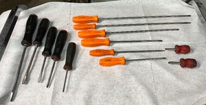 lot 24 image: Snap-on Tools Orange Handle and Black Handle Screwdrivers, various sizes.