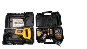 lot 33 image: Dewalt Electric Reciprocating Saw DW304P 1 18 stroke. Dewalt DCF883 38 Cordless Impact Wrench. Lithium Battery.