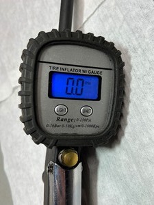 lot 32 image: Tire inflator with gauge