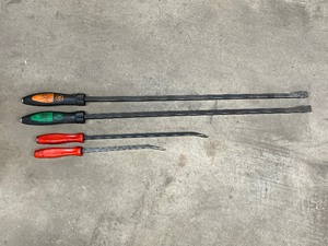 lot 34 image: (2) Matco long screwdriver flat head, (2) Snap-on striking pry bars