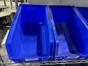 lot 17 image: Uline Blue Plastic Stackable Bins and Gray Stackable Containers (Cart not included)