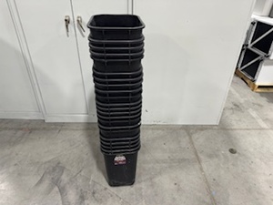 lot 33 image: 28 Quart Rectangular Black Trash Cans. Quantity 22.