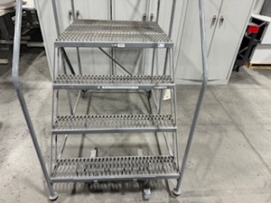 lot 83 image: Four Step Rolling Ladder with Brakes
