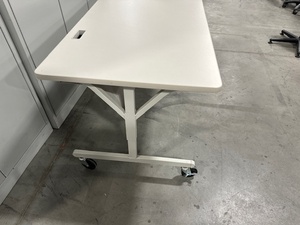 lot 87 image: Rolling Work Table - manual Adjustable Height, cord cutout