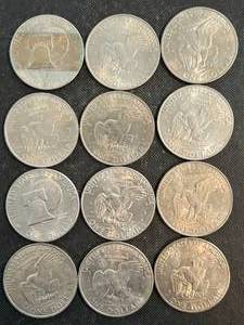 lot 37 image: 12 US IKE DOLLARS