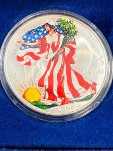lot 79 image: 2000 AMERICAN SILVER EAGLE IN COLOR 1 TROY OZ .999 FINE SILVER