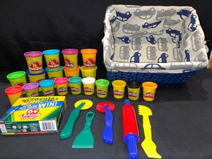 Lined Wicker Basket with Playdoh and related toys plus Crayons