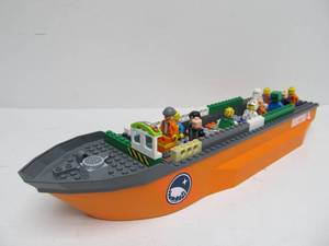 lot 84 image: Lego Arctic-5 Large Orange Boat With Figurines