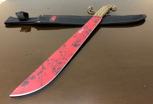 lot 93 image: Like-New DEAD HEDZ Skull Camo Machete - Red
