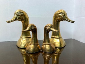 lot 110 image: 2 Sets of Mid Century Brass Duck Head Bookends