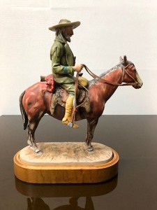 lot 281 image: Vintage Gorham Western Figurine  A Trapper After Frederic Remington