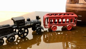 lot 283 image: Estate Lot wVases Cast Iron Train Cars & Binoculars