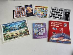 lot 303 image: Collectible USPS Stamps The World of Dinosaurs, Alfred Hitchcock, Comic Strip Classics, Marilyn Monroe