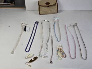 lot 304 image: Lot of Misc. Bedazzled and Chain Belts, Handbag