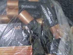 36 AA Duracell Batteries open box...