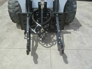 lot 39 image: Wolverine Motorized 3 Point Skid Steer Adapter  PTO