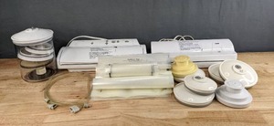 lot 129 image: Lot of 2 FoodSaver Vacs with New FoodSaver Vacuum Bag Rolls and Accessories H